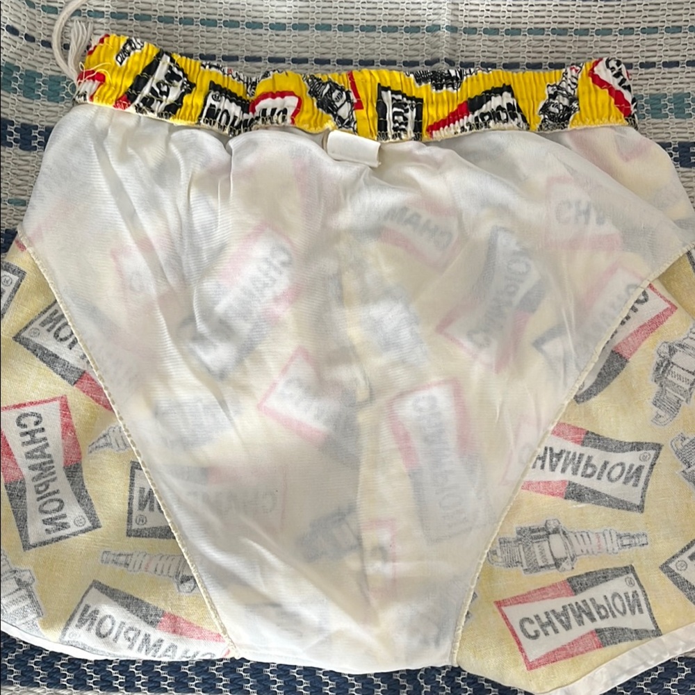 Vintage Champion L spark plug Yellow and Red swim trunks rare Novelty - Picture 9 of 12
